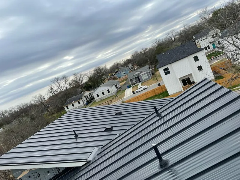 Standing seam metal roof panels with vents for Skylight Repair in Moorhead